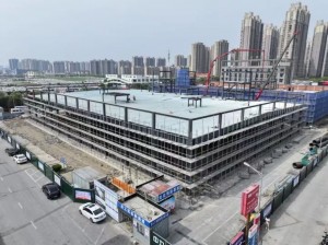 multi-story-steel-building-construction-interior-column-grid-12x9m-bolting-phase-crane-lift.jpg