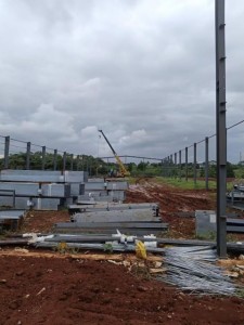 Steel_Warehouse_Construction_Nigeria_Column_Installation_Wind_Resistant_Design.jpg